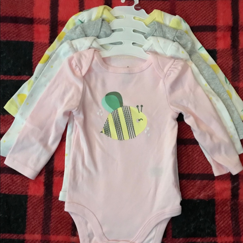 Set of four long sleeve onesies